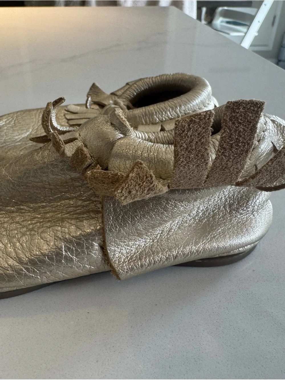 Freshly Picked Metallic Gold Fringe Baby Moccasins